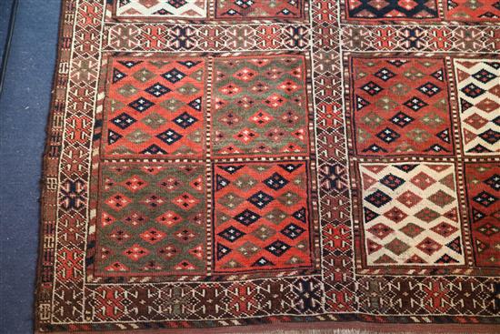 A Turkoman red ground rug, 6ft 2in by 3ft 7in.